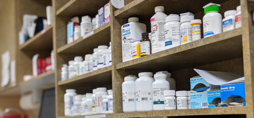 bottles on a pharmacy shelf